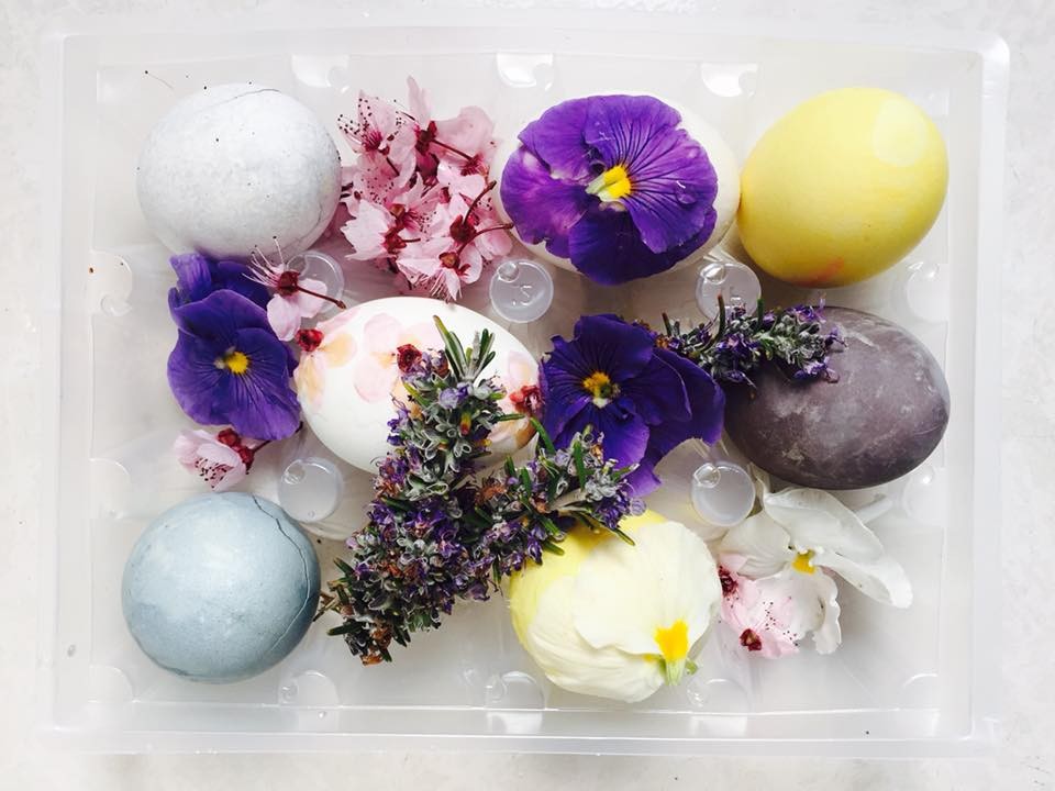 Easter eggs decorated with natural dyes and pressed flowers